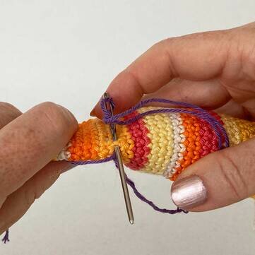 Picture Fig 13 working last stitch of knee