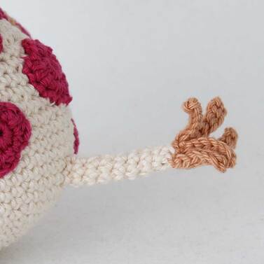 Picture of crochet giraffe tail detail