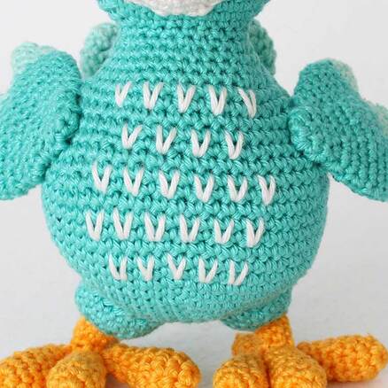 Picture of embroidered detail on crochet Dodo's chest