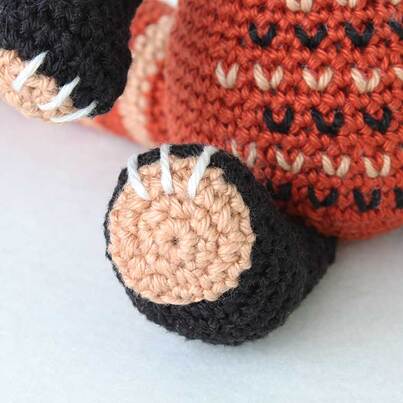 Crochet Red Panda - picture of embroidered claw detail on Paws.