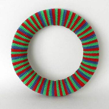 Picture of crochet wreath cover on polystyrene ring - front view